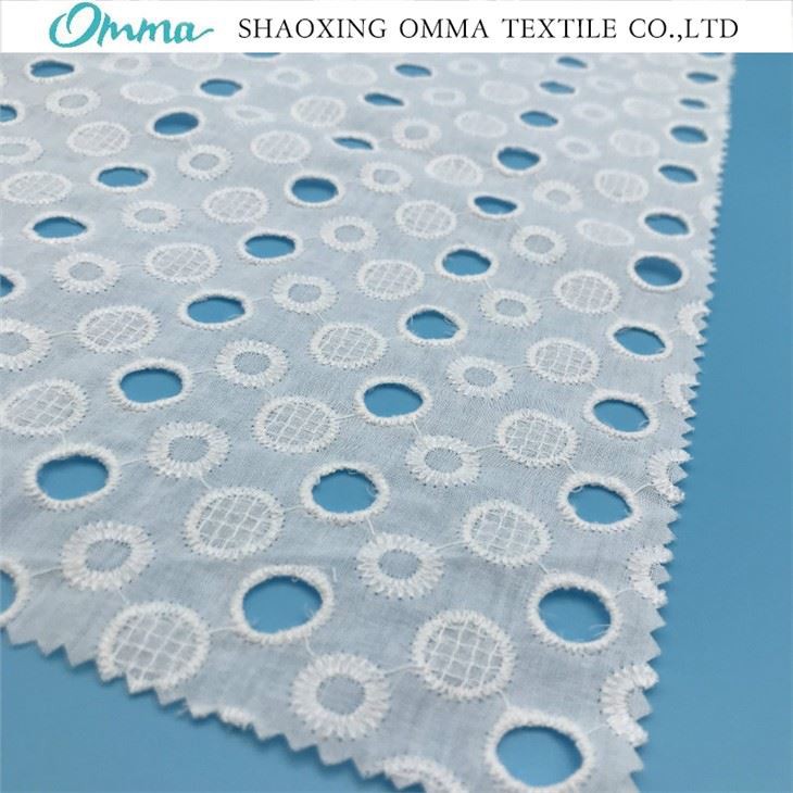 White cotton embroidered fabric